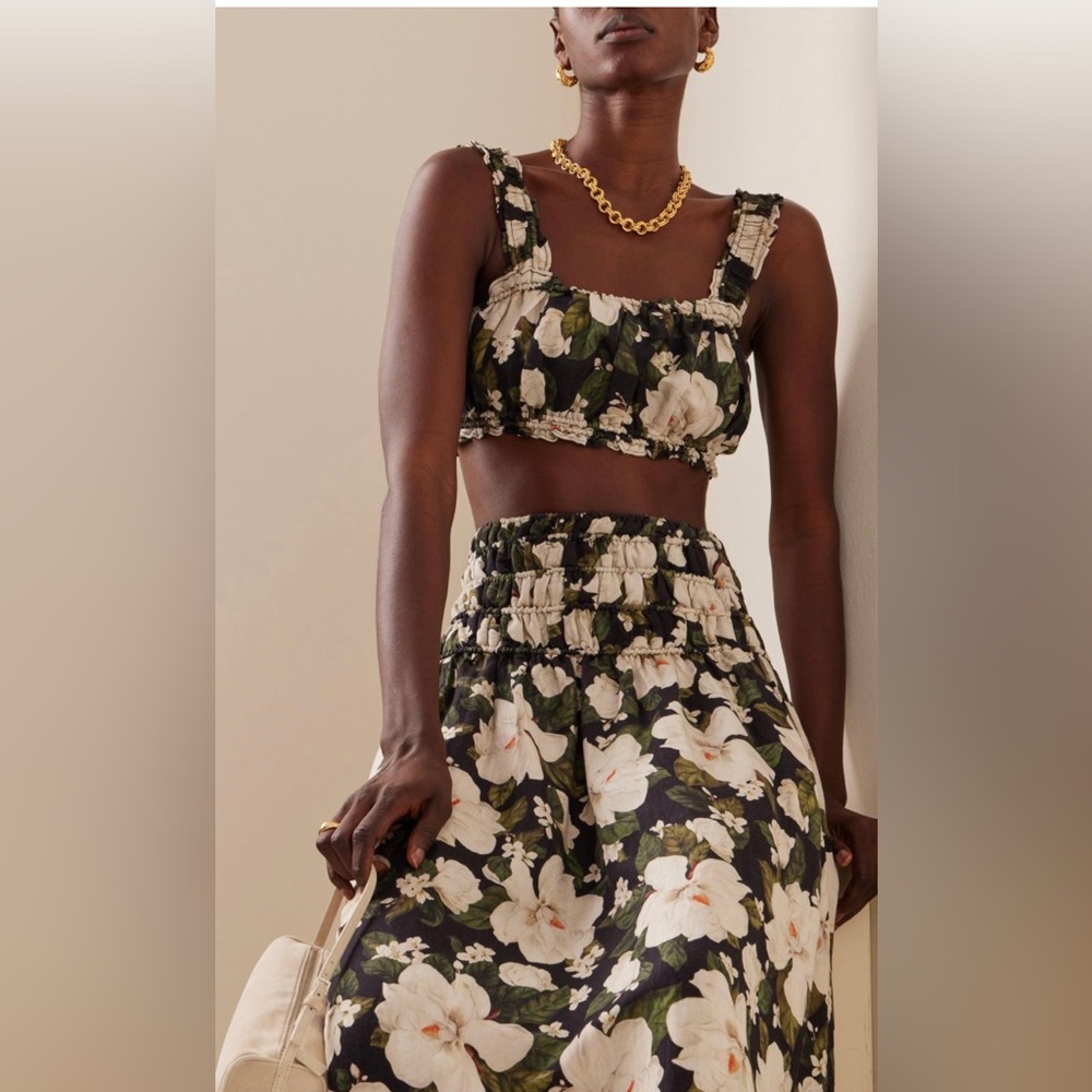 Posse matching linen crop top and skirt.